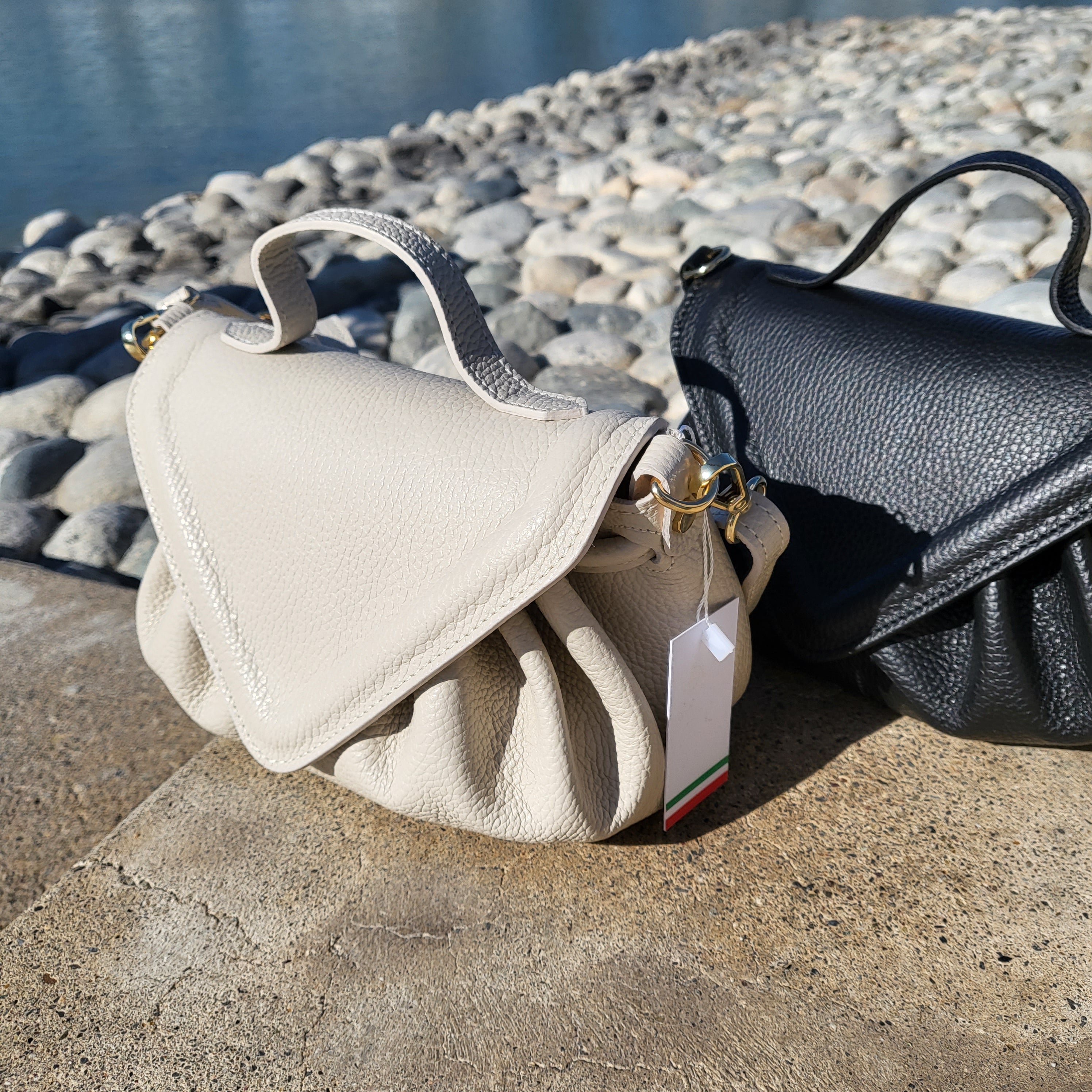 Carro Positano Italian leather woven clutch bag